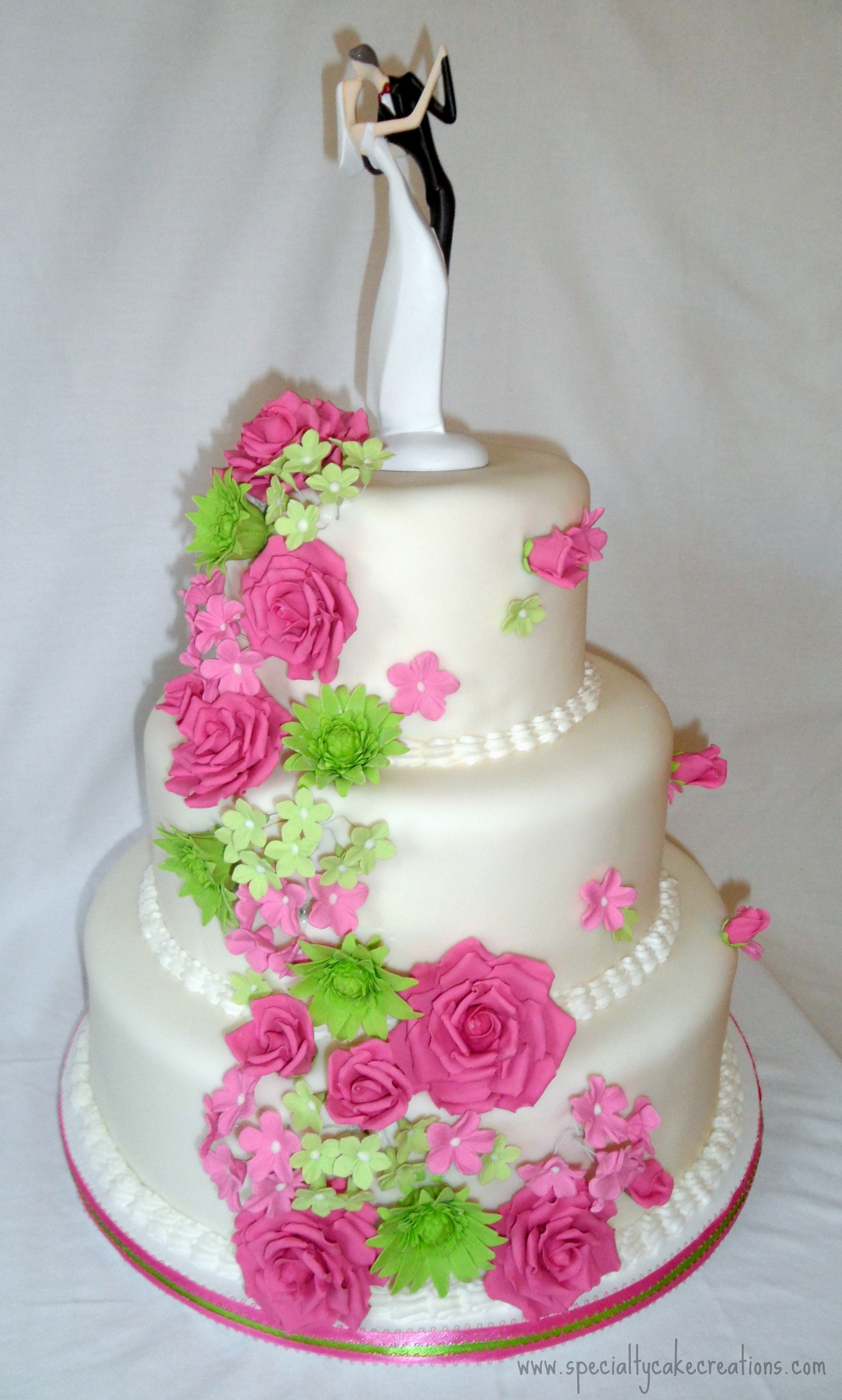 wedding cake and cascading flowers